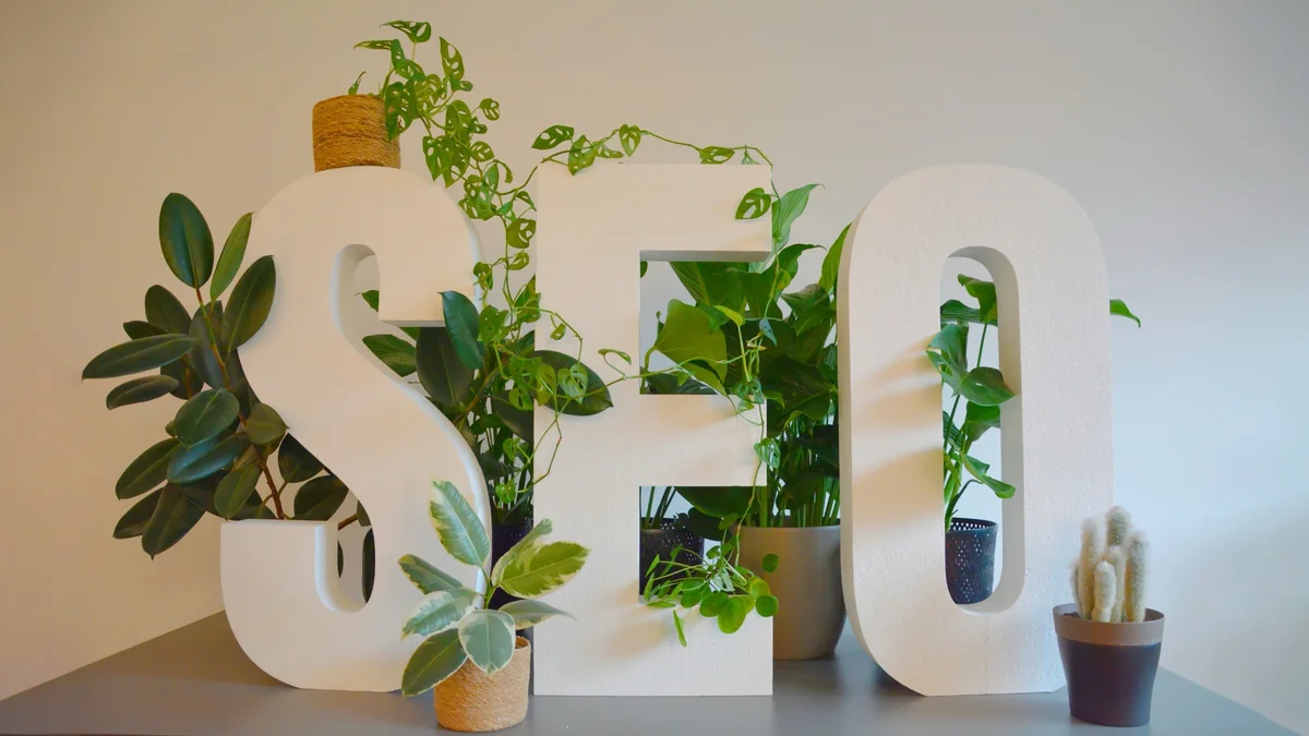 Large SEO letters with flora behind them